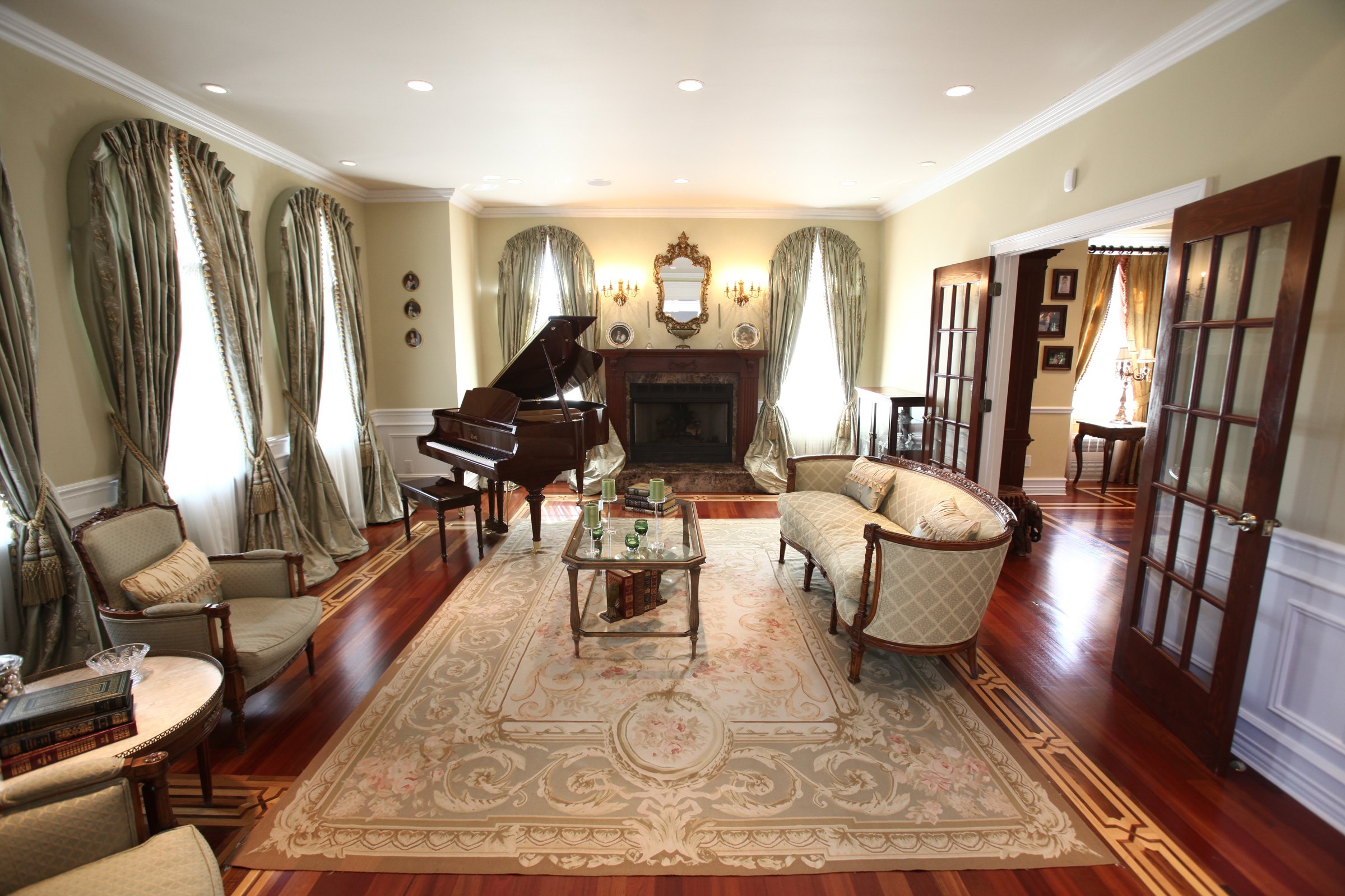  This home at 5 Center Drive in Malba Queens was built from the ground up in 2002. The living room includes a grand piano. 
