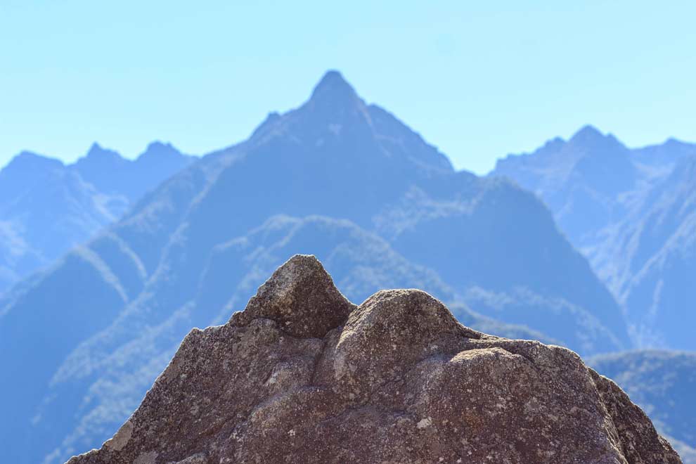Incan Sculptures mirror the mountain ranges. BRILLIANT.
