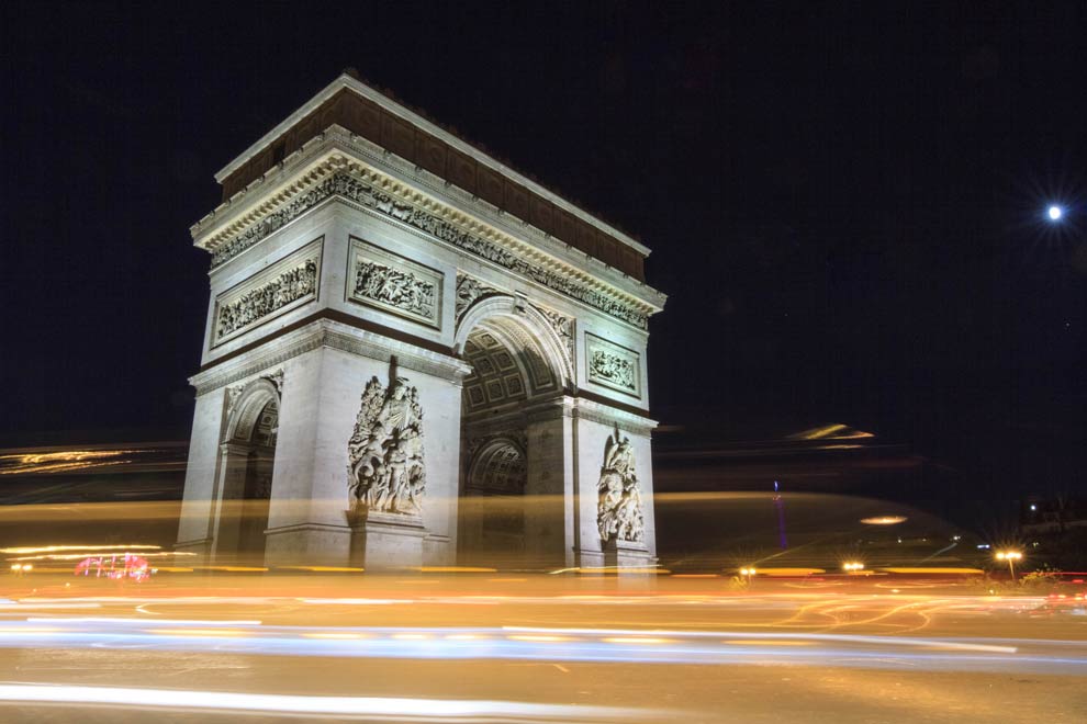 Long exposure could be cool, light trails of cars, and fireworks off in distance...