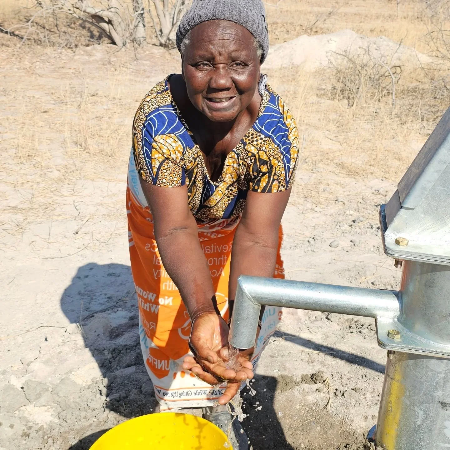 "This is Ngobe Village [in Zambia]. At this village this is the only well. People used to walk long distances going to the river to draw their drinking water. It took them 1 hour 30 minutes to get to the river.&nbsp; They are so happy to see wat
