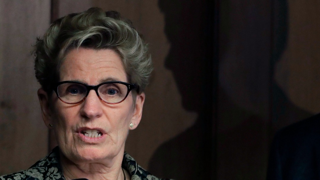 Kathleen Wynne’s government plans to retaliate against U.S. states that adopt “Buy American” policies. (Carlos Osorio/AP)