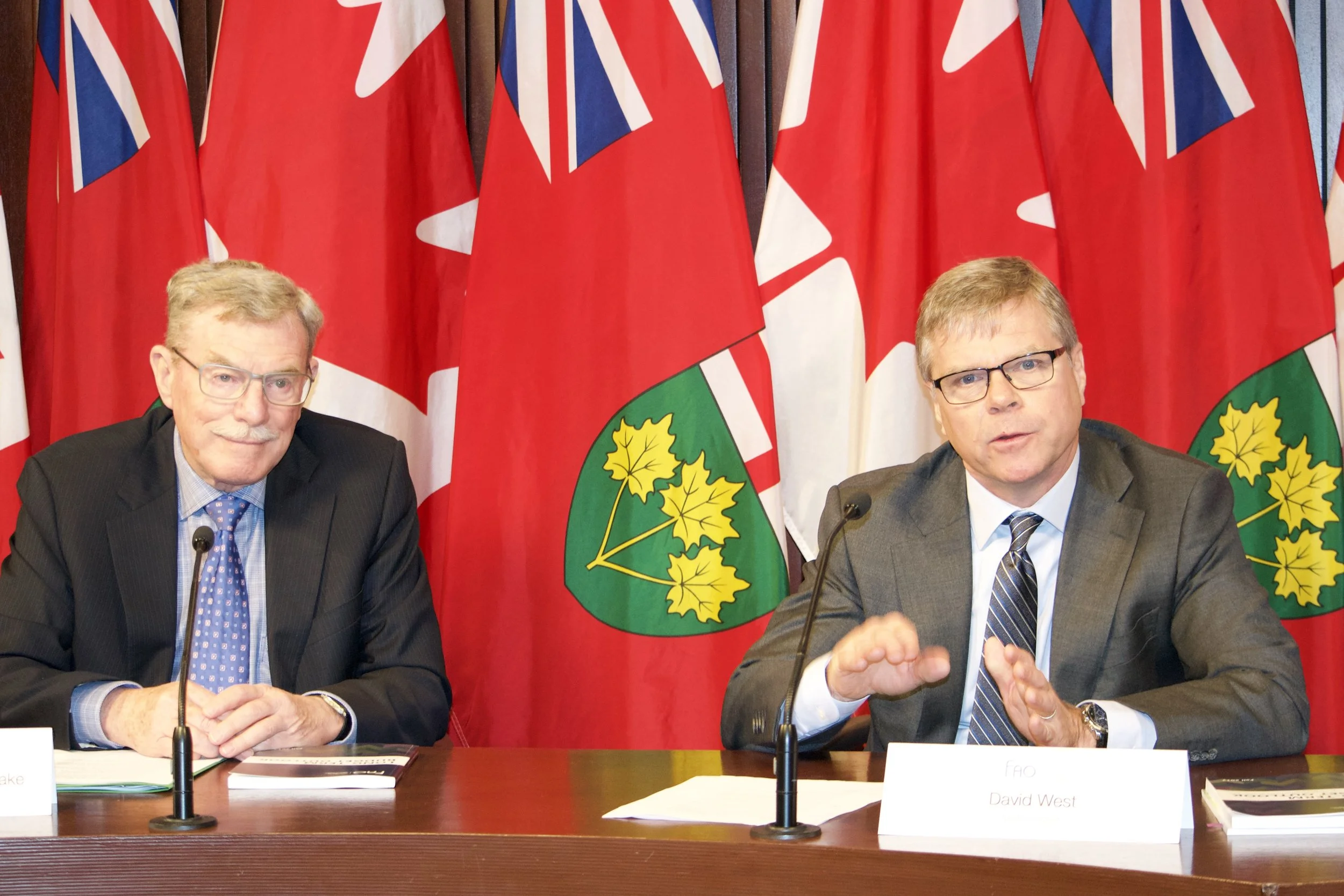 The FAO’s David Wake (left) and David West presented a long-term budget outlook Thursday at Queen’s Park. (Sarah Reid)
