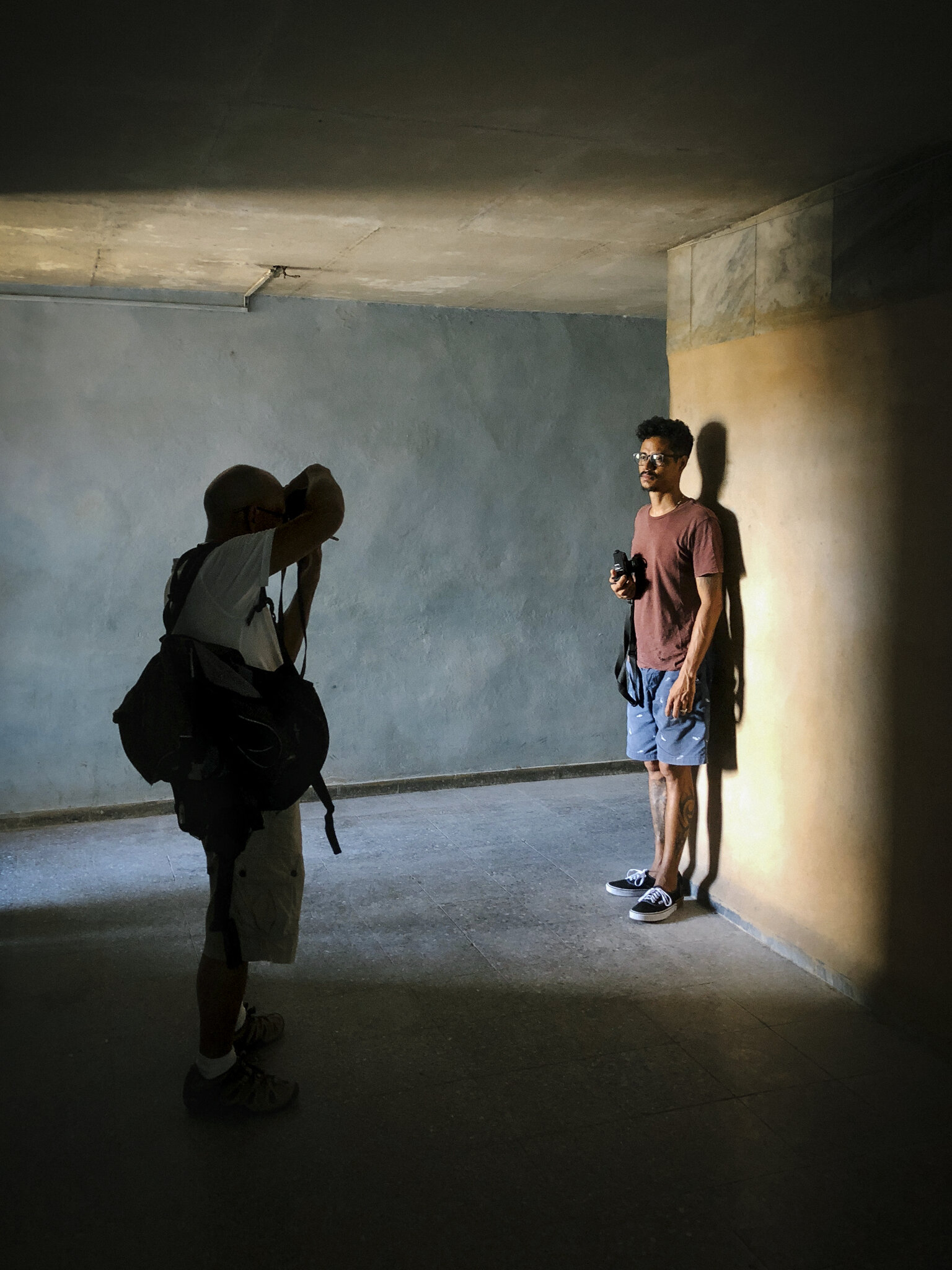  Cuban photographer Raúl Cañibano taking Arien “Chang” Castán’s portrait in Centro Habana, Havana © James Clifford Kent   Drawing on fieldwork and practice-led research, the major exhibition This is Cuba: Documentary Photography after Fidel (Royal Ho