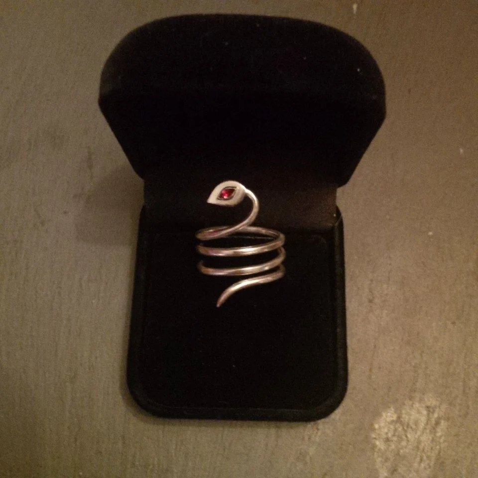 Snake ring with marquise cut garnet in eye - SOLD