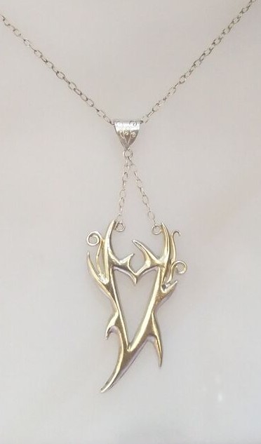 Silver spiky pendant with spiral detail - BUY