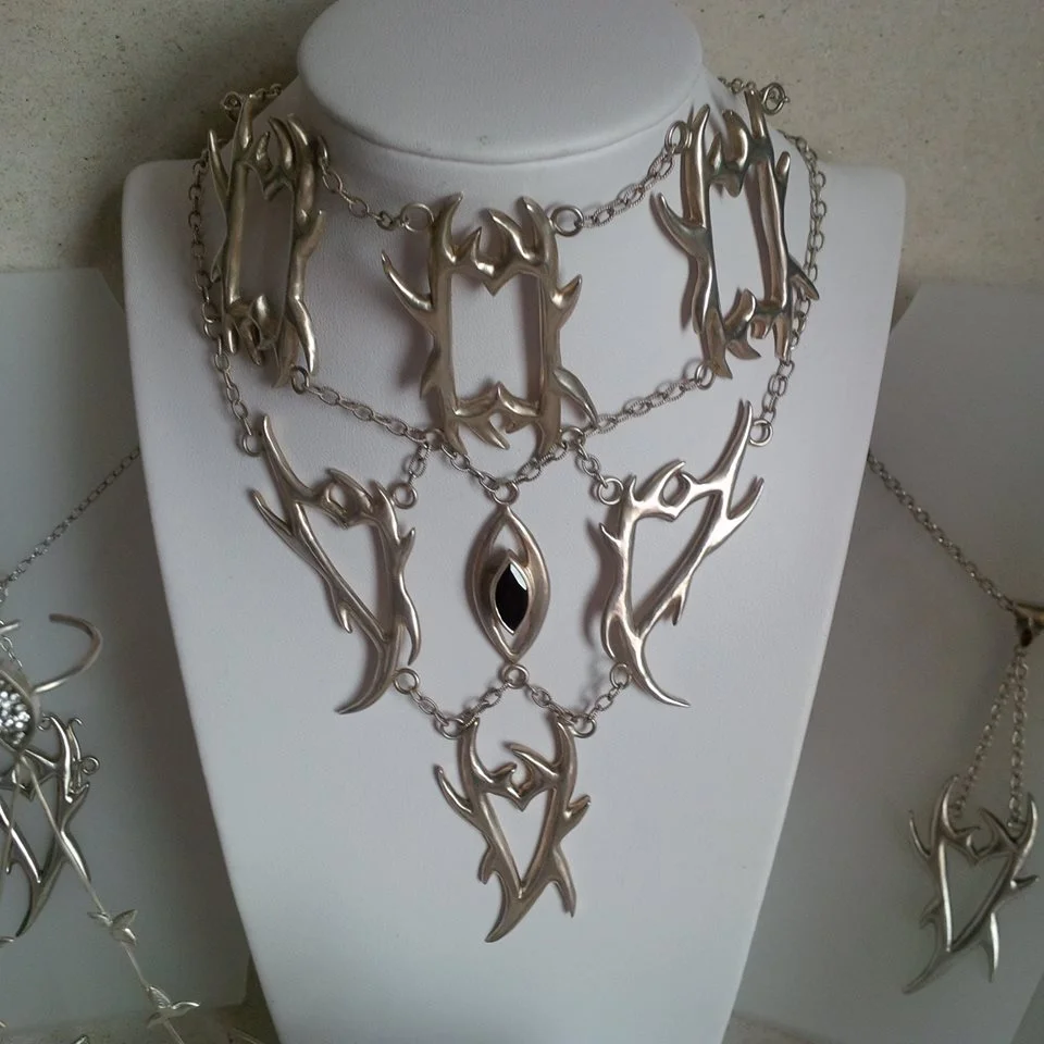 Three-tiered spiky necklace with central marquise cut garnet - BUY