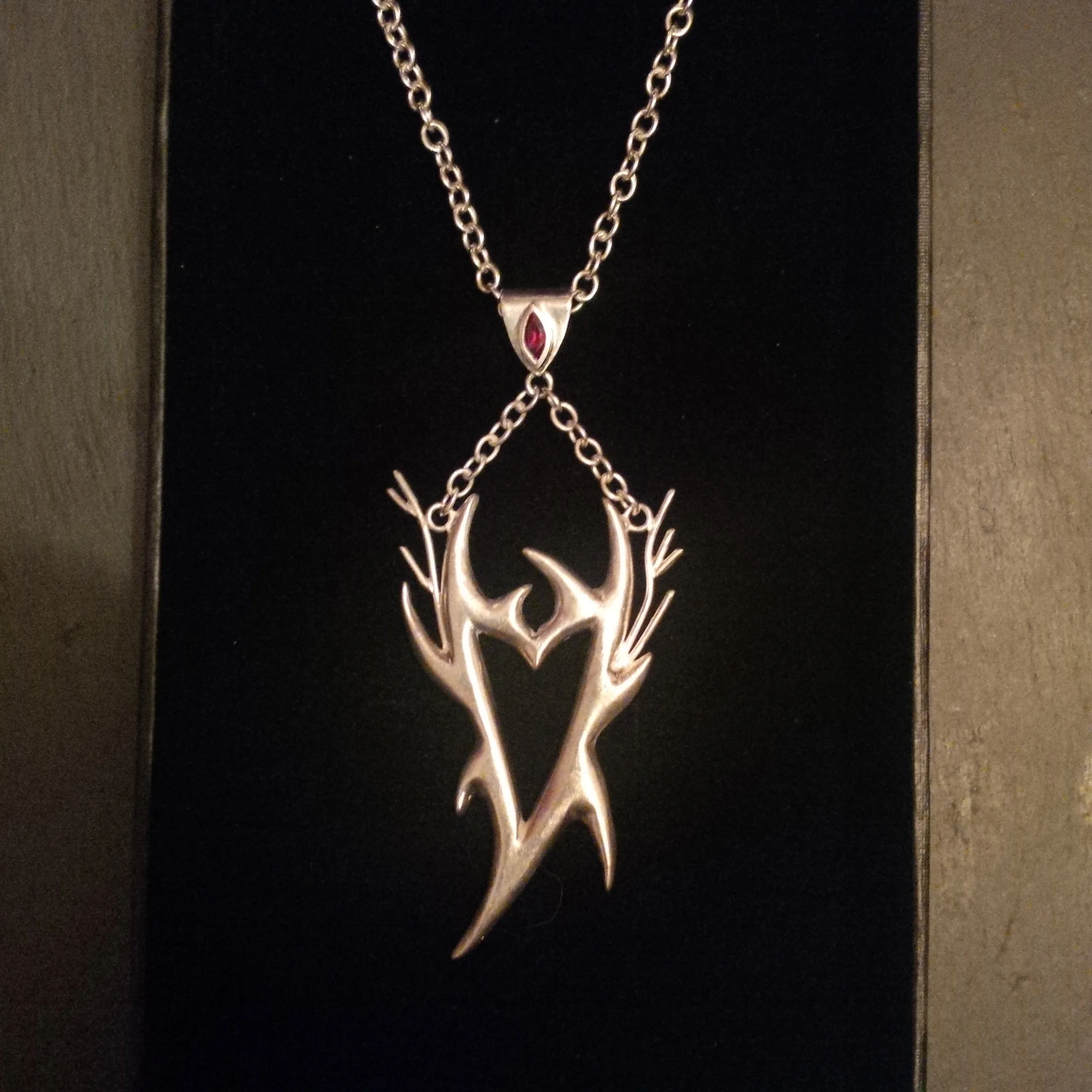 Spiky pendant with wirework detail and marquise cut garnet in the bail - NOT FOR SALE
