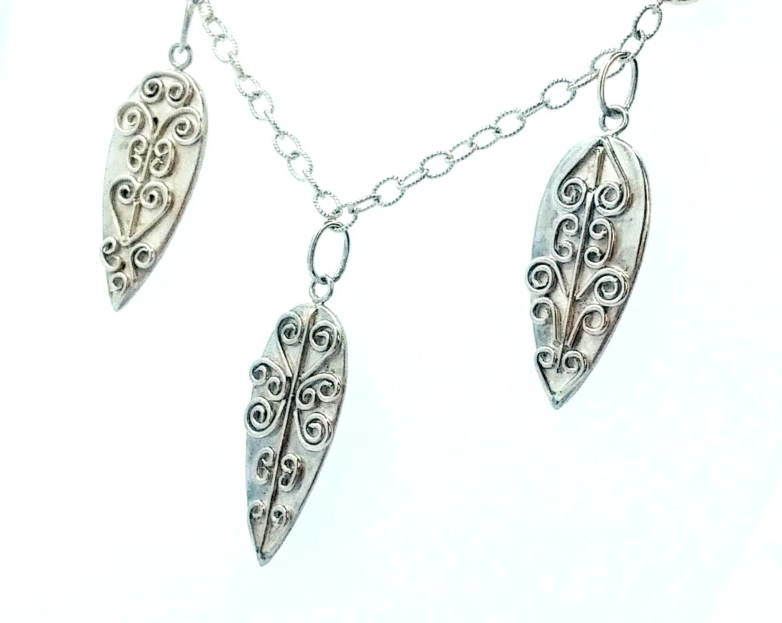 Silver necklace with three dangling pieces and wirework detail - BUY