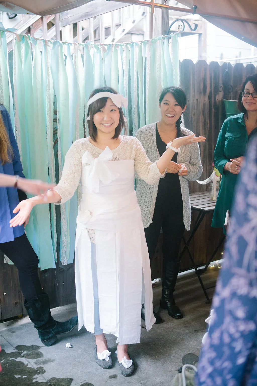 This is a pretty good toilet paper wedding dress--look at the accents on the shoes! Haha