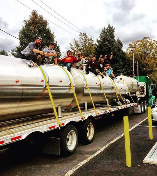 Neshaminy Creek Brewing Company crew with their horizontal lagering tanks.