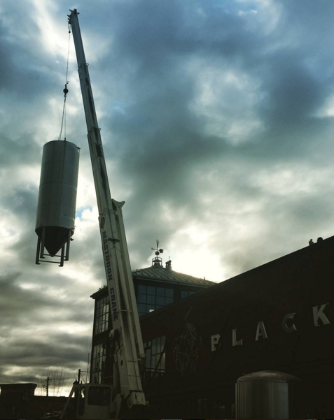 A 100BBL Fermenter being installed at Great Northern Brewing Company.