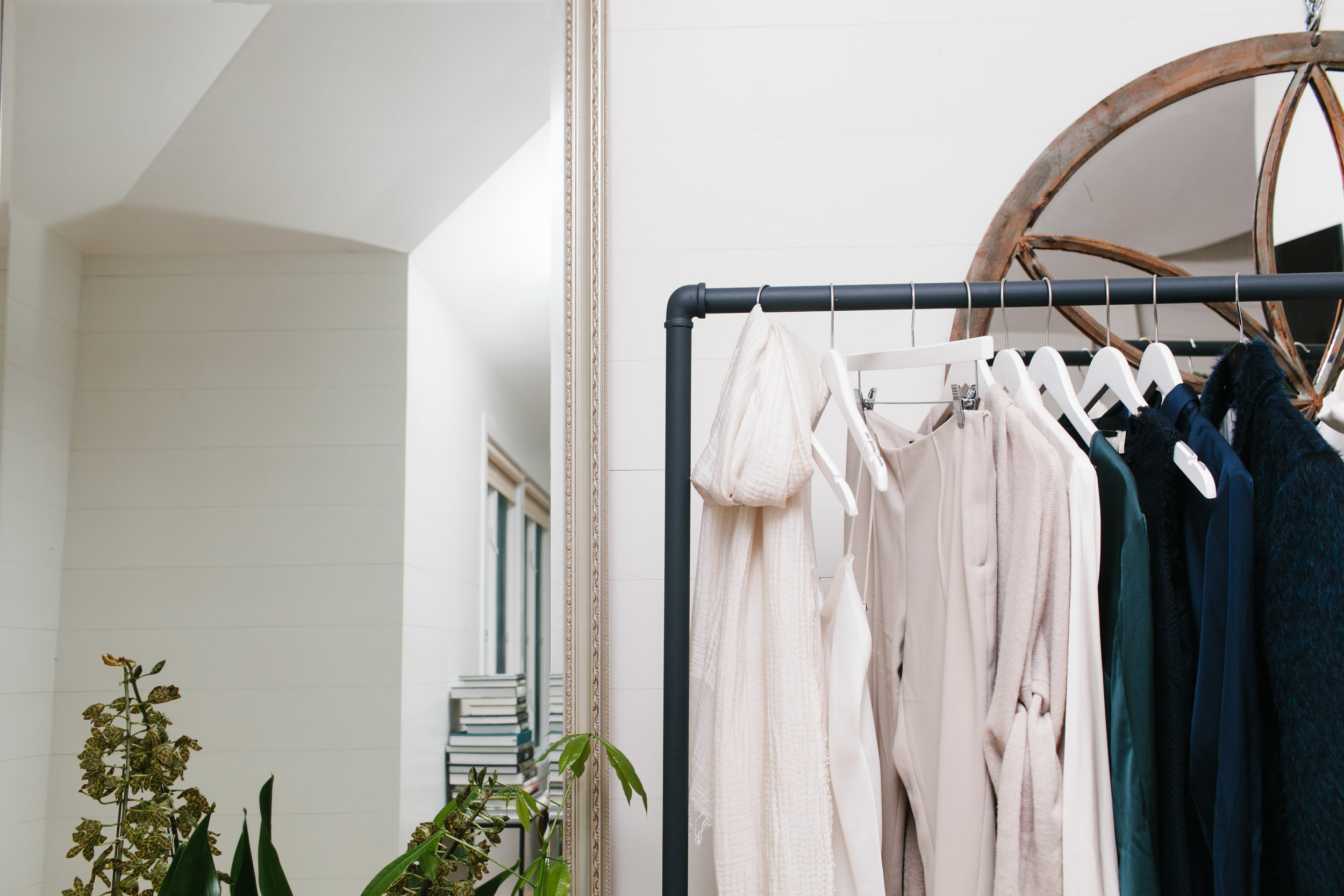 I am in the fashion business, and run my own business from home sometimes, which means that clothing racks and rails are part of my stock and trade. I decided to abandon the bright reflective steel once and for all and use Railings to give the racks class, presence, a graphic quality. Perfect.