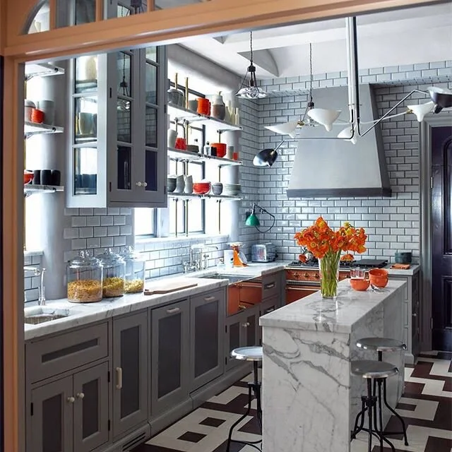 Marble countertops in a delightful kitchen, love it