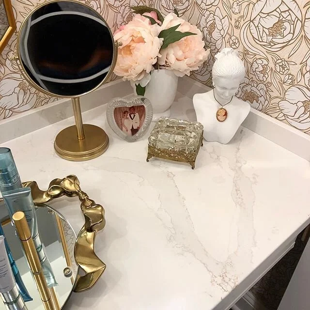 Add a #quartzcountertop to turn the class up a notch! We&rsquo;re loving this closet turned vanity by our client @lilmissoriginal #remodelnj #calacatta #designer #customcountertops