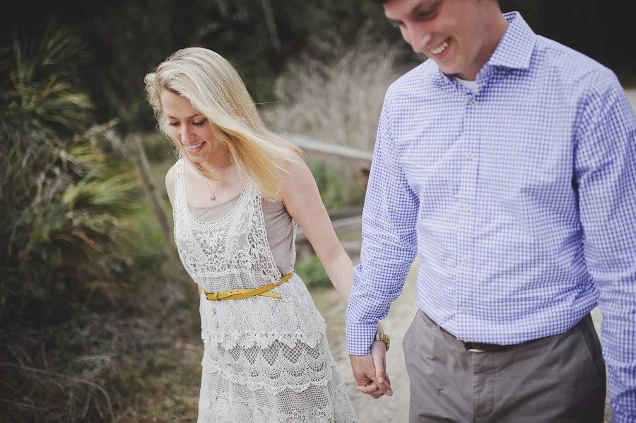 engagement pictures in a field