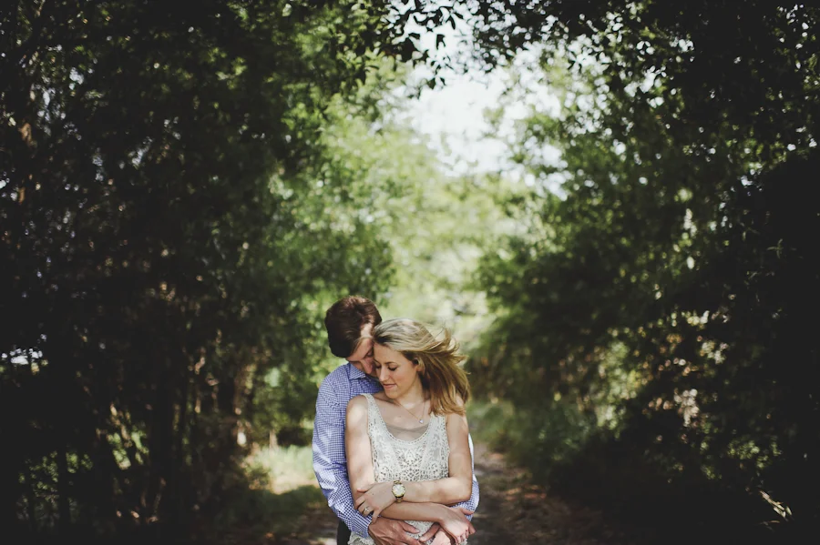 engagement pictures in a field