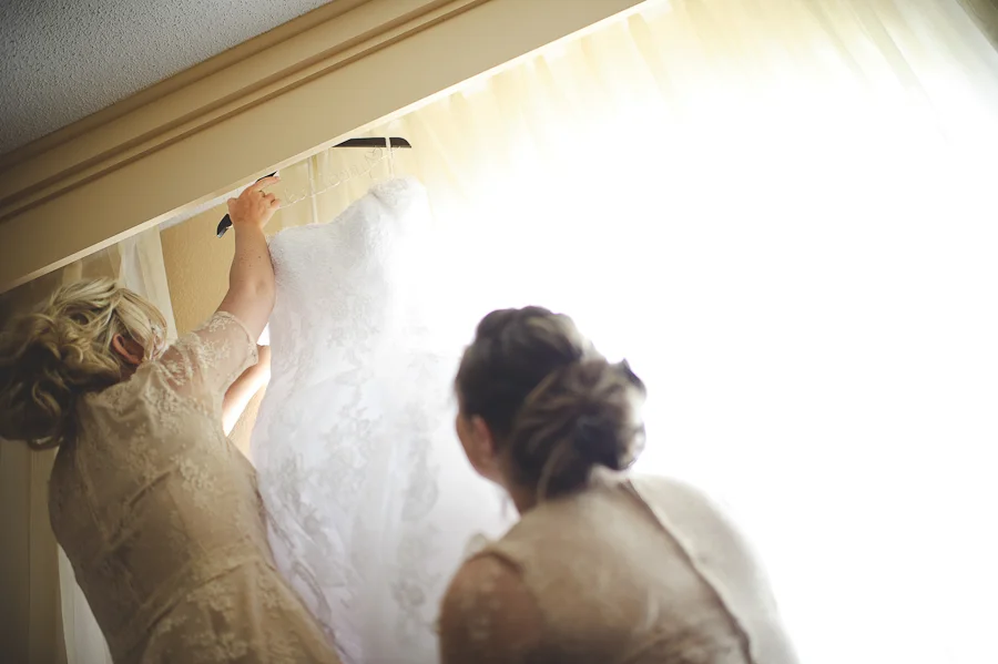 bridesmaids getting dress down