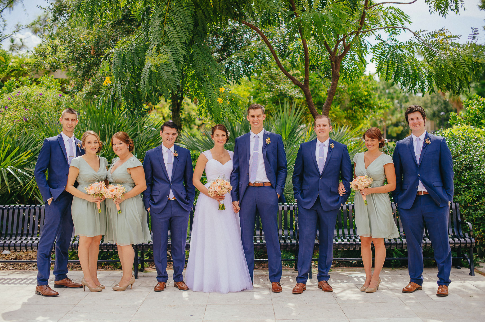 winter park florida wedding party, peach, white, ivory, green, blue wedding attire