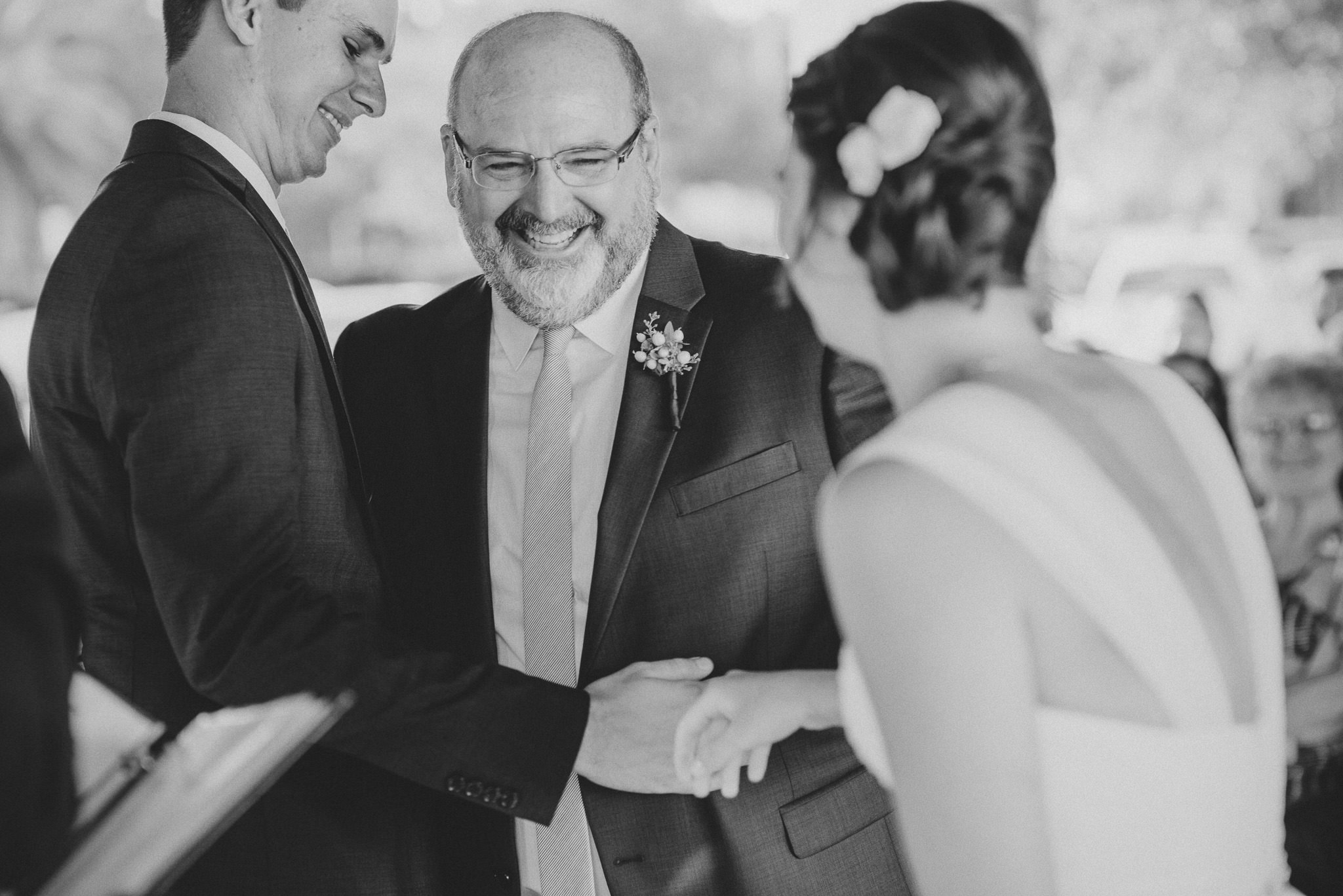 father giving daughter away at wedding