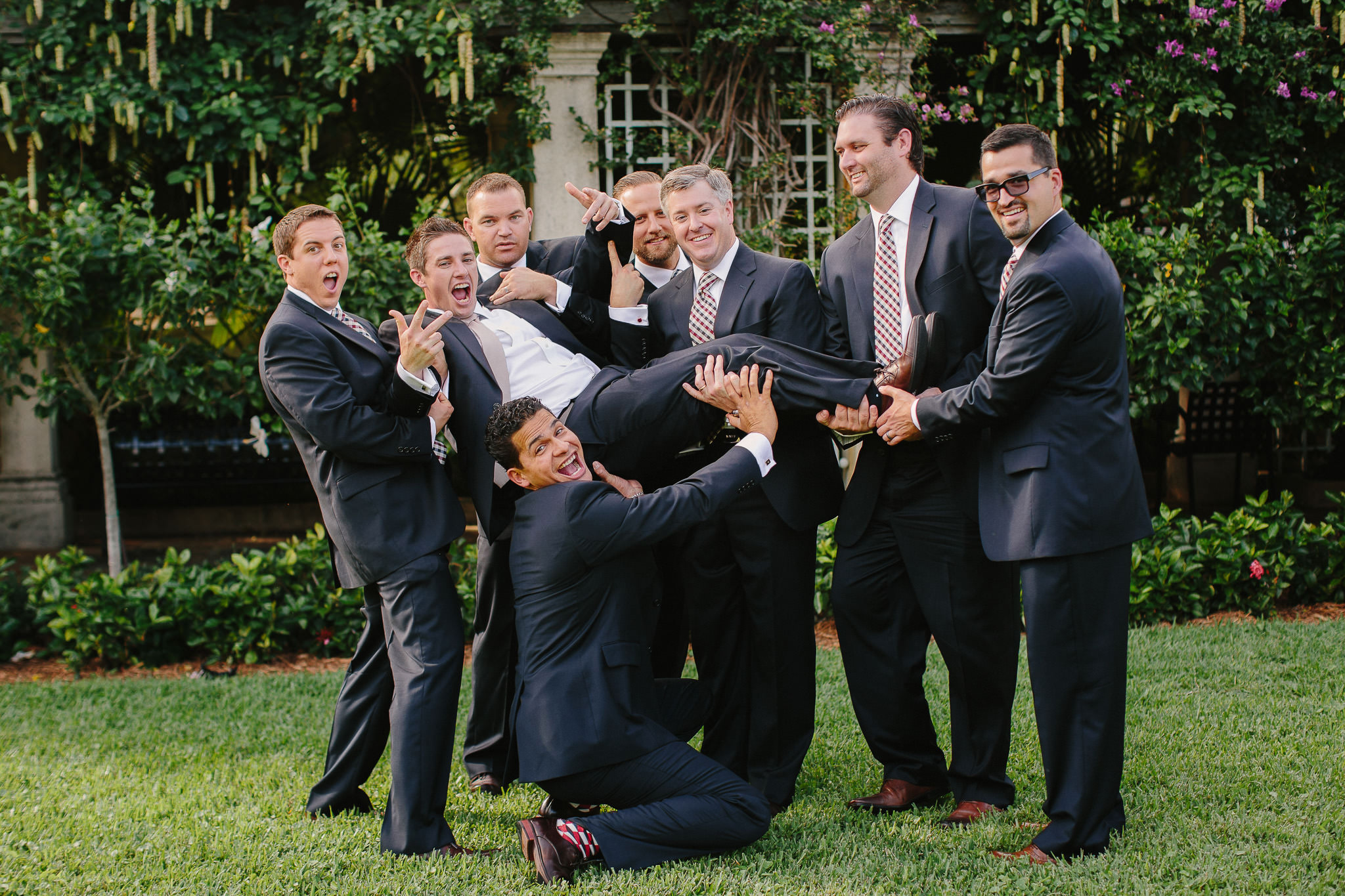 Navy Suit with champagne and plaid tie Groomsmen 