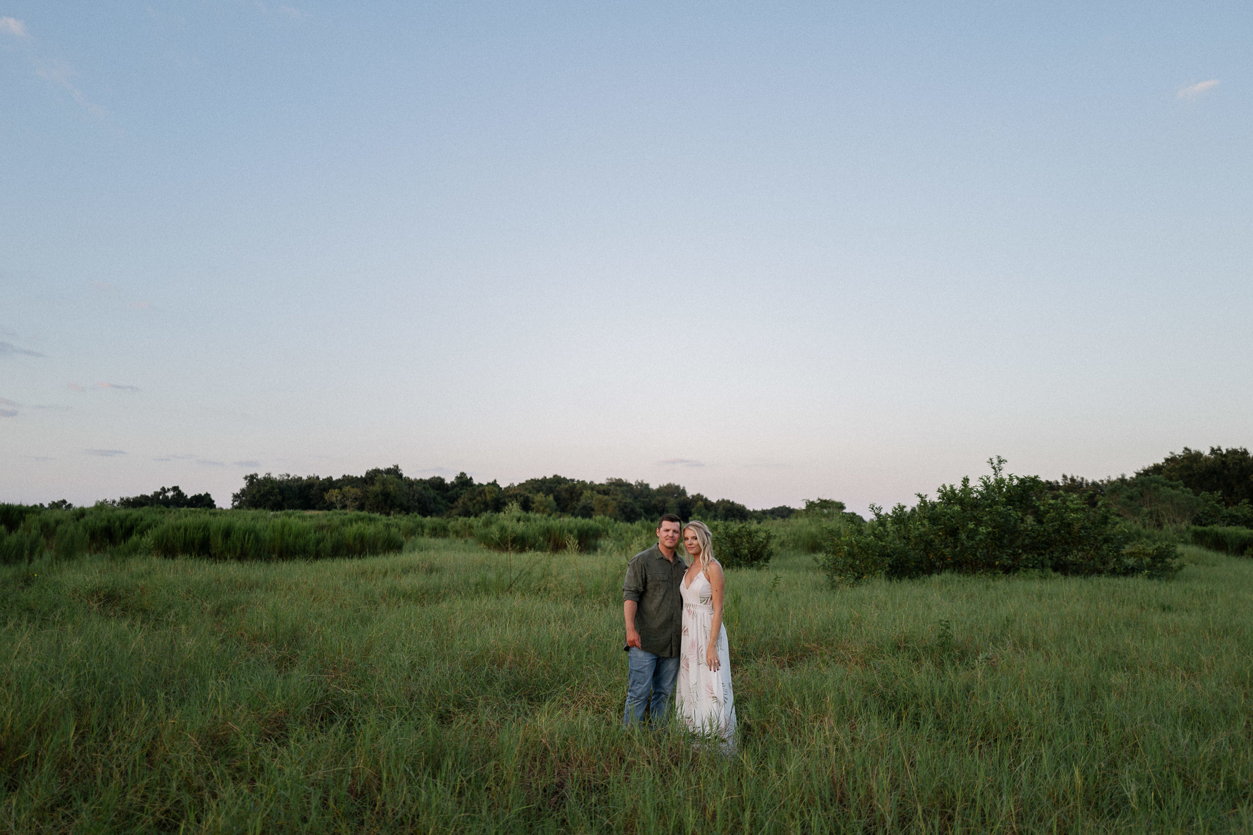 Grassy Field Engagement Session Central Florida