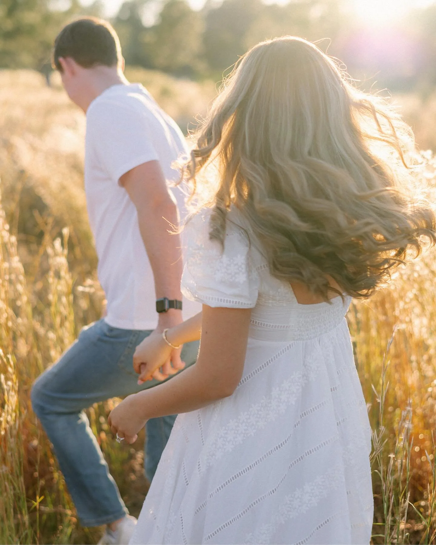 I could run through a field of golden light for a thousand years and never get tired of it.  Such a beautiful evening with @juliamusso and Brad. 

#engagement #sunglowphotography #goldenhour #lakeloisastatepark
