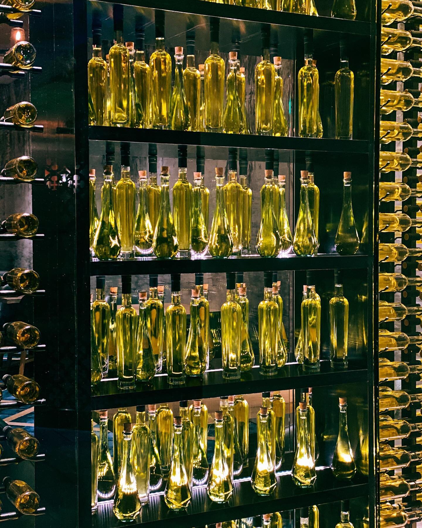 Olive oil wall &gt; wine wall 

#oliveoil #interiordesign #winewall #restaurantdesign #hospitalitydesign #hoteldesign #gaylordpalms #kissimmee #architecture #florida