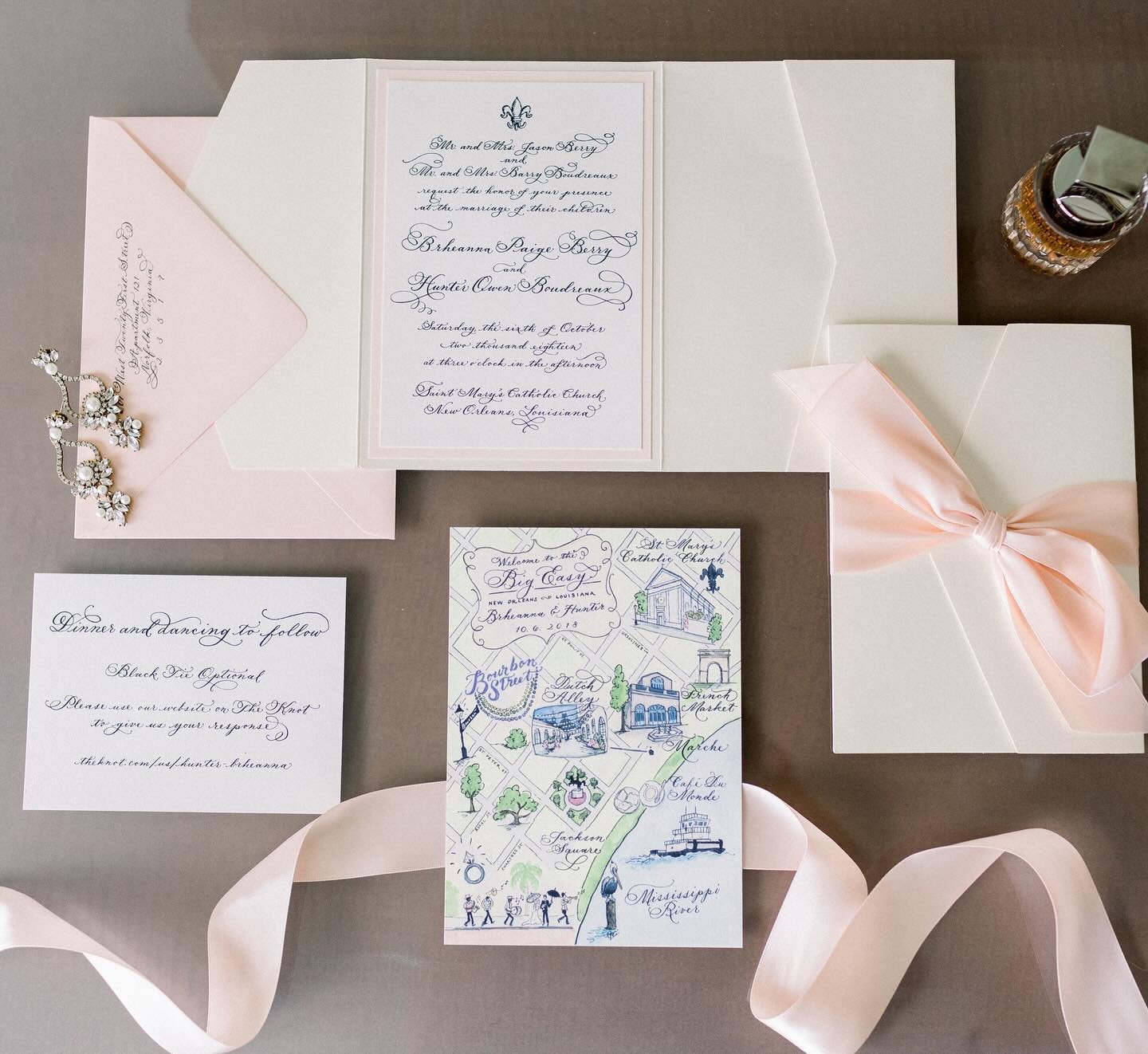 Watercolor map of New Orleans slipped into a custom calligraphy pocket fold tied with a blush ribbon. 

#luxurywedding #luxuryinvitations #pocketfold #weddinginvitations #weddingstationery #stationery #calligraphy #pointedpen #weddingmap #weddingsuit