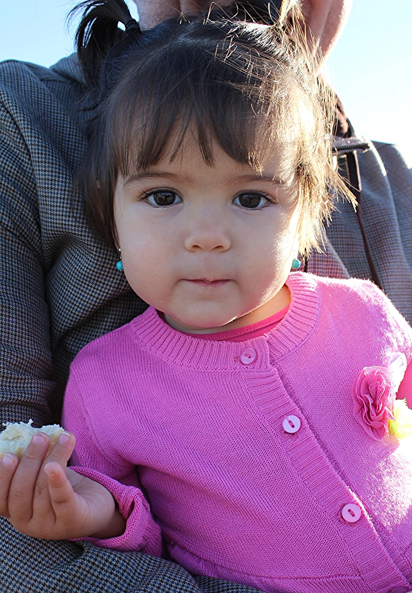 I love this picture of my baby girl! She is so content in her daddy's arms =)