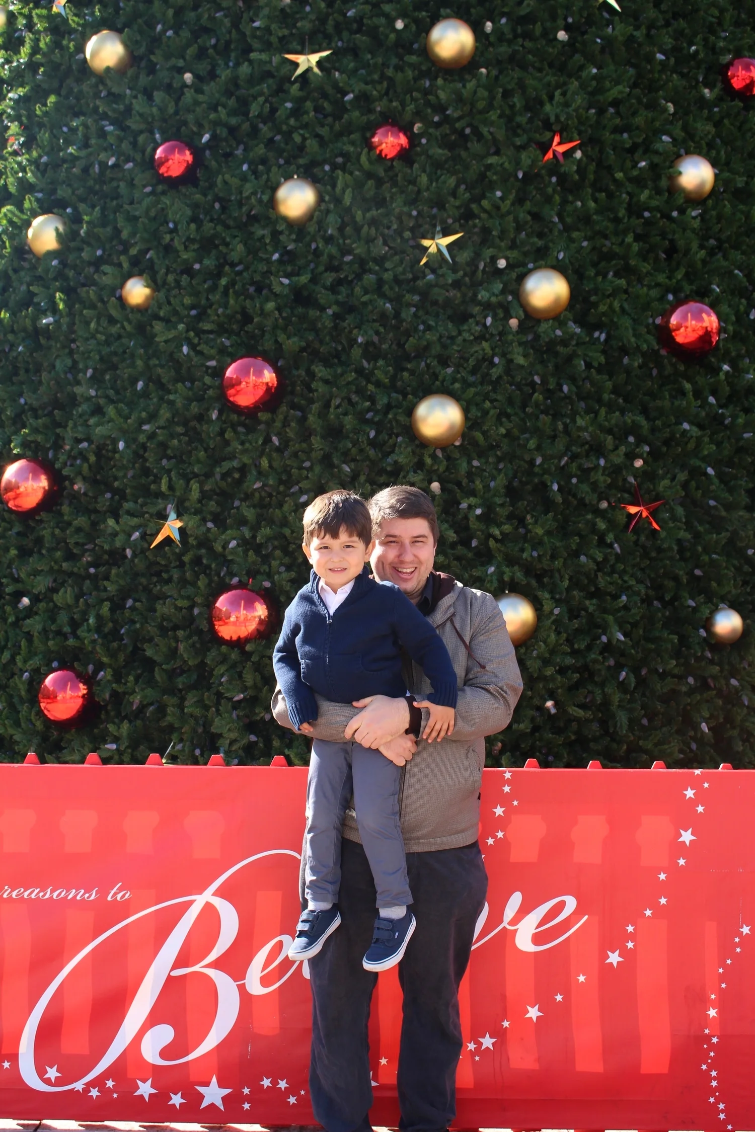 Mark Jacinto and Papi at Union Square by the giant Christmas tree. Love you guys<3