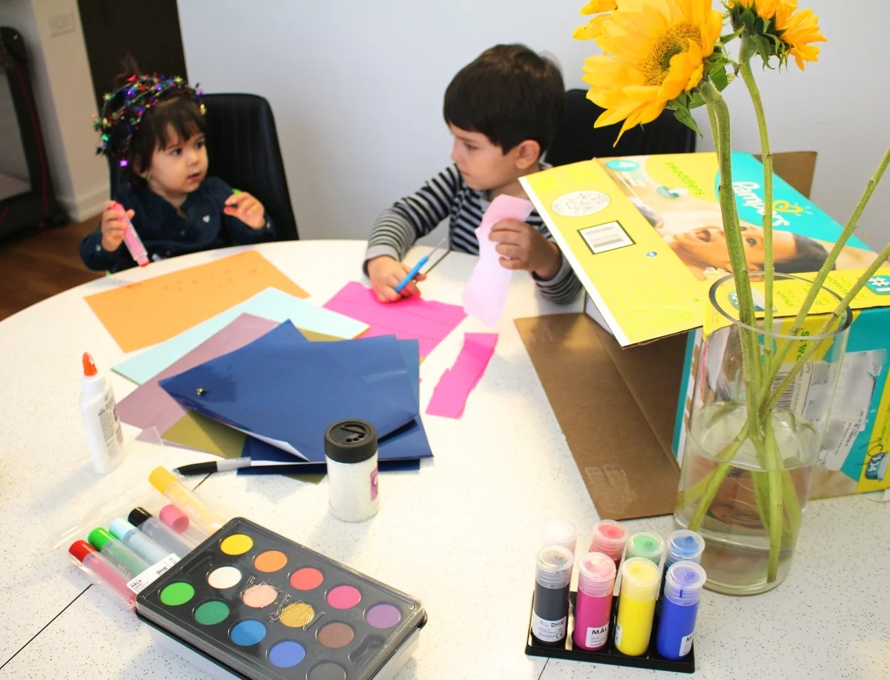 Dominika in her crafting crown and Mark Jacinto focused on cutting paper close to the lines=)
