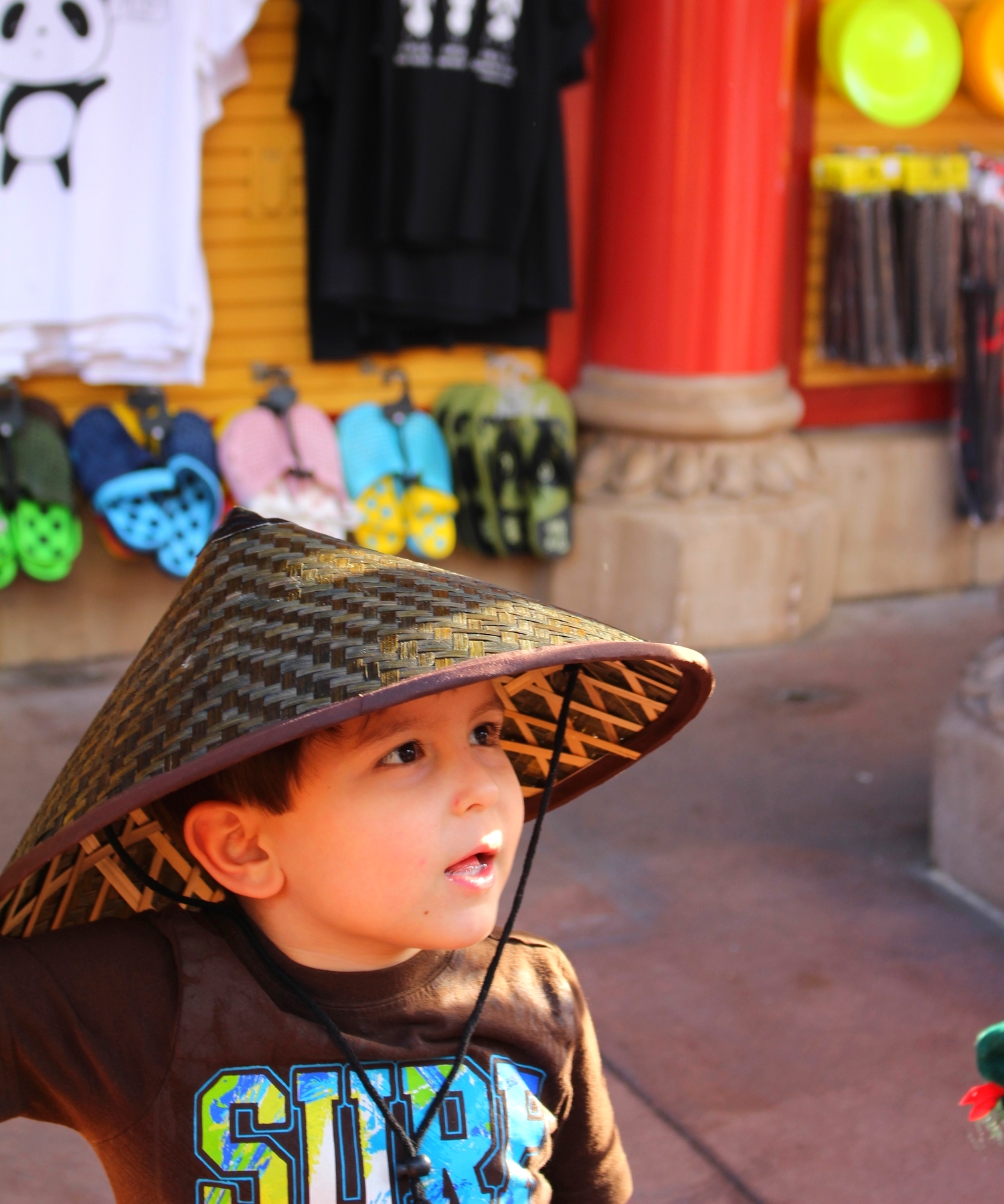 He is rocking this traditional Chinese hat.