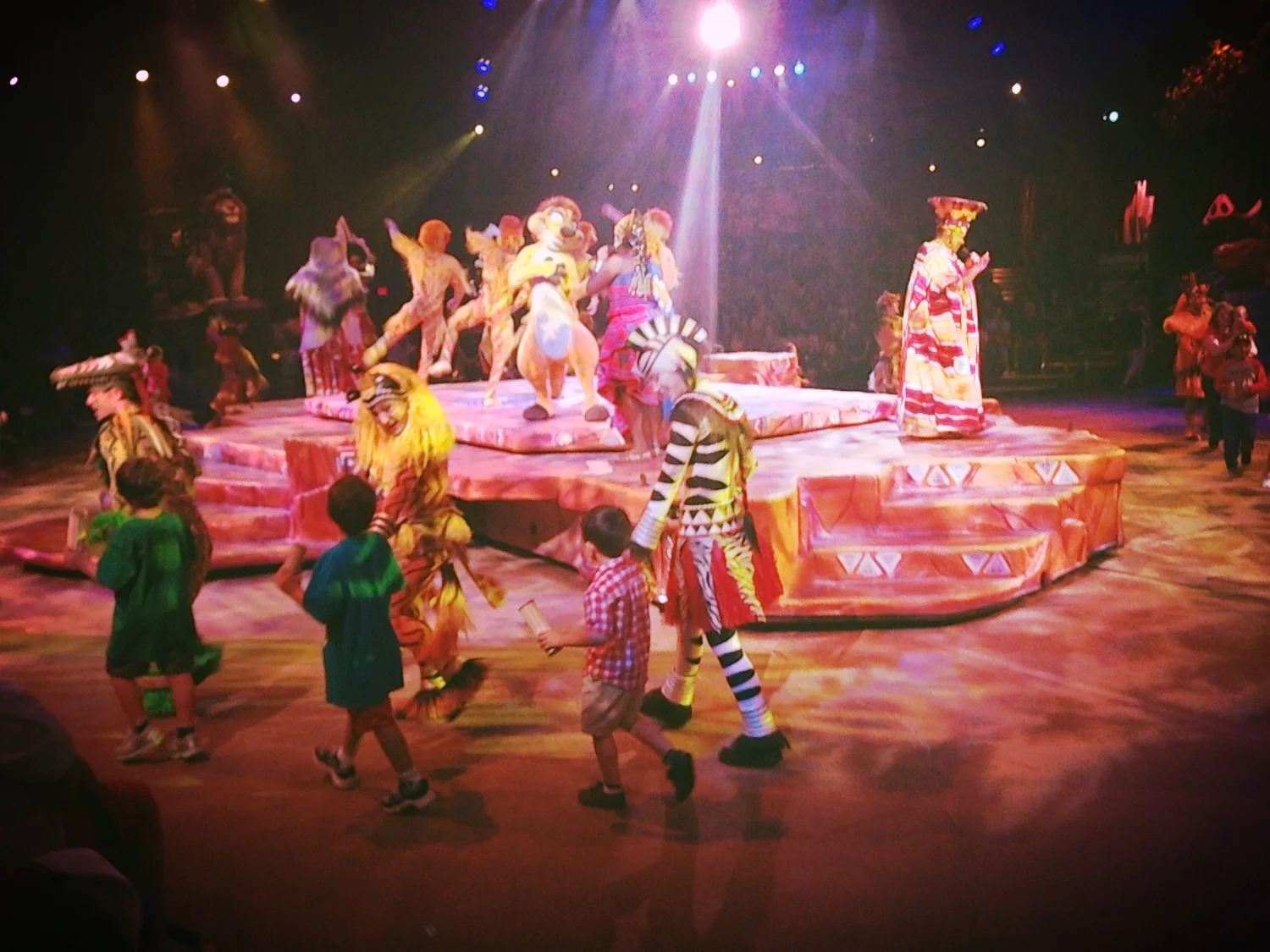 At the Lion King show, Mark Jacinto was chosen to meet the characters. He gave a high five to the guy.