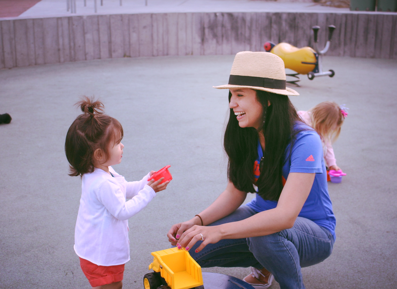 Playing make-believe with mami.