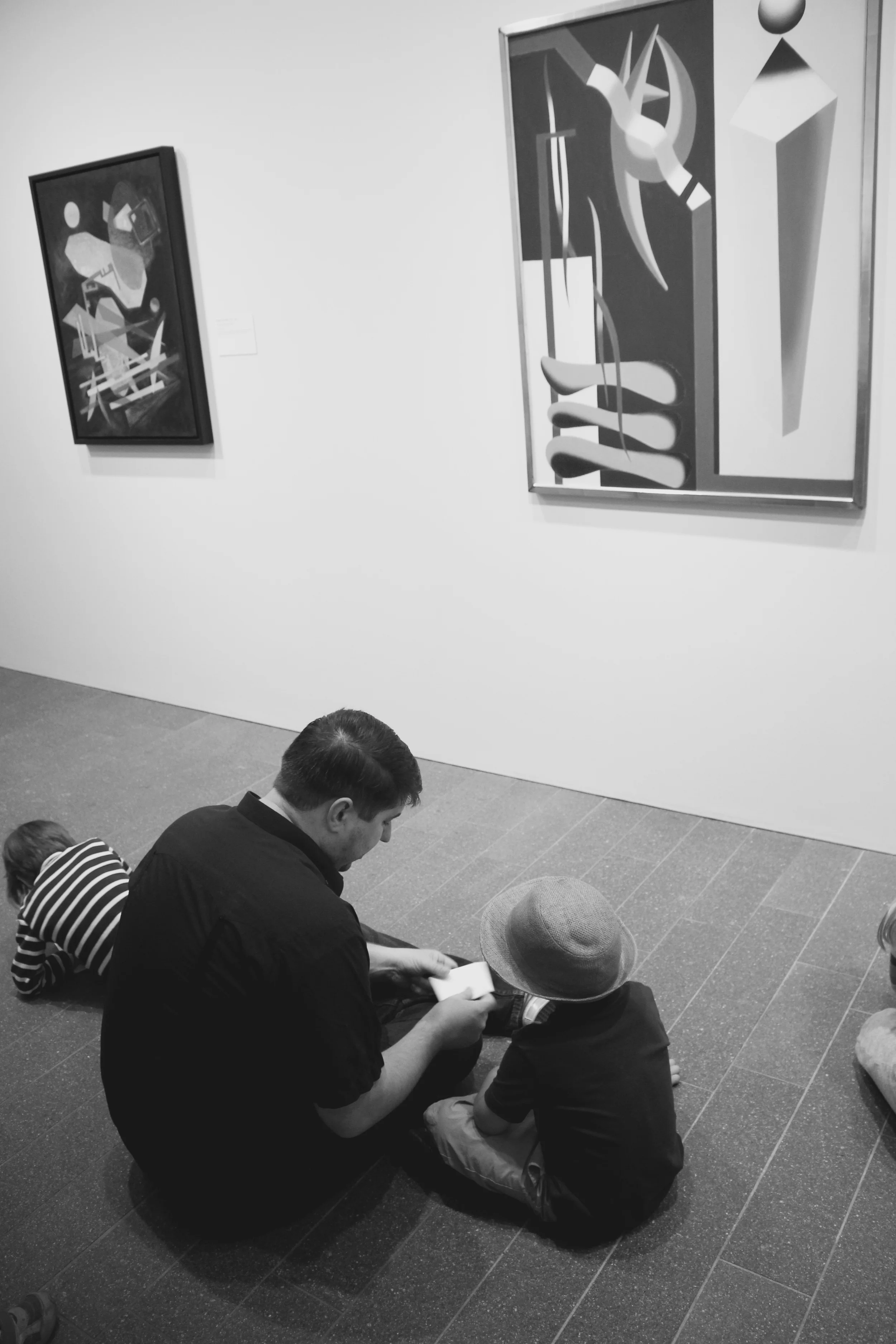 The art teacher send the kids to sketch their vision before painting.