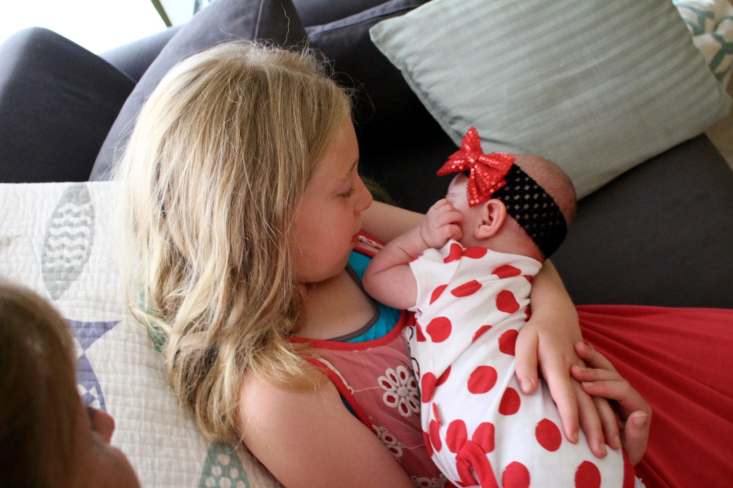 Ava holding baby M <3