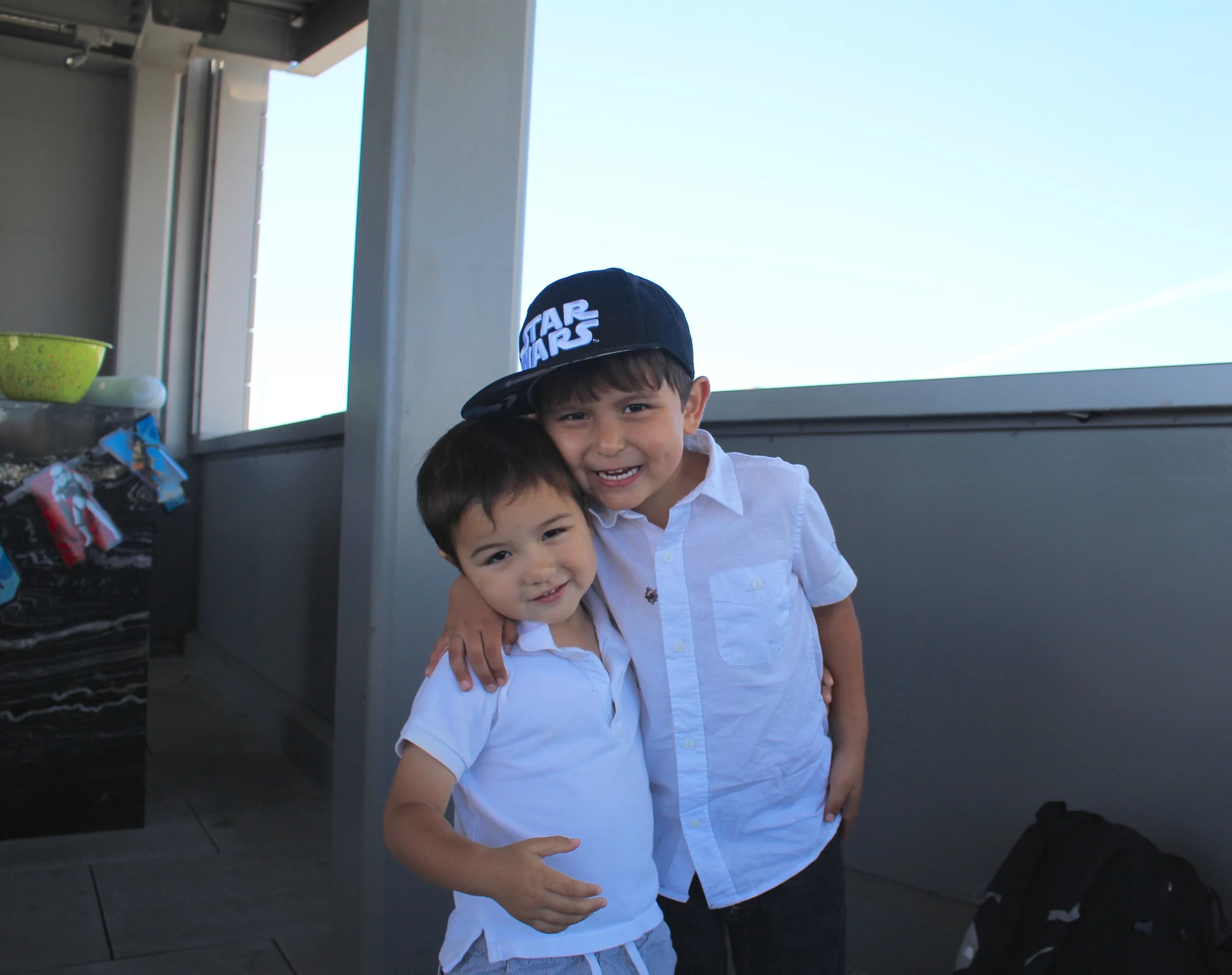 With his friend Alexander.