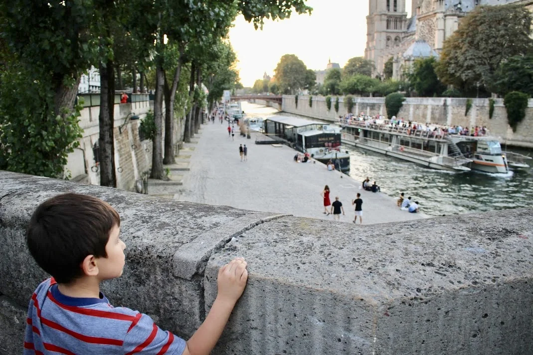 a kid pondering.