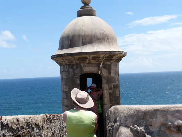 Dail photographing a mom and her son in a guard tower at El Morro. Taking a photo of Dail in the tower I lost my hat. I recovered it, luckily, but only after an extraordinary effort along the parapet. I thought it was gone with the wind.