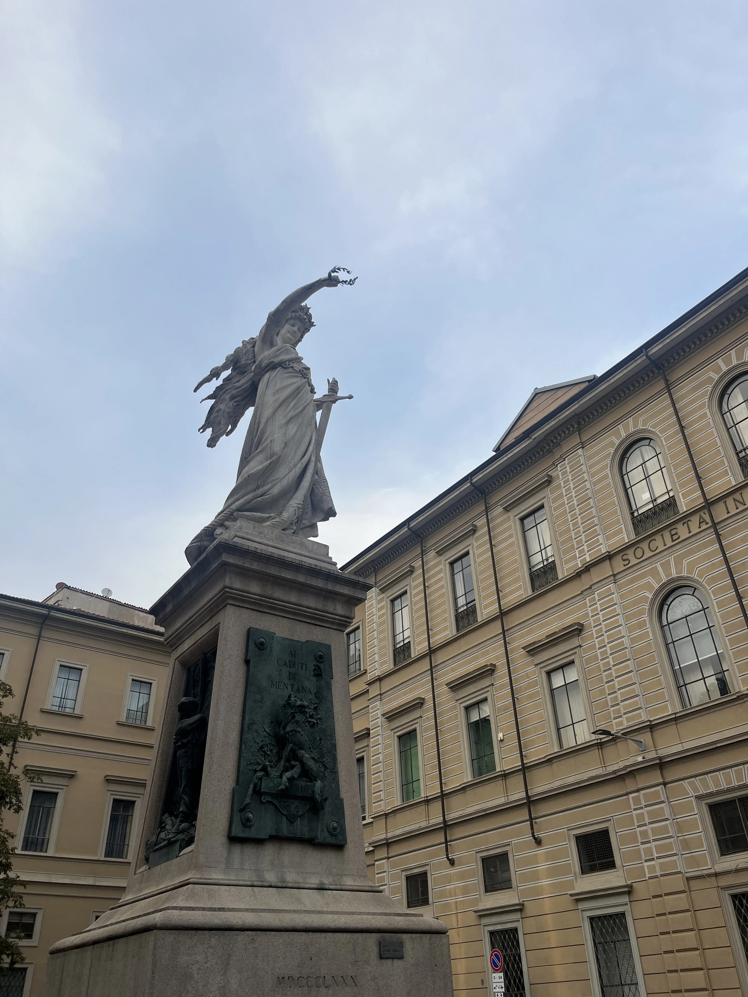  I love all these statues in the street corners in Milan, and finding the stories behind :) 