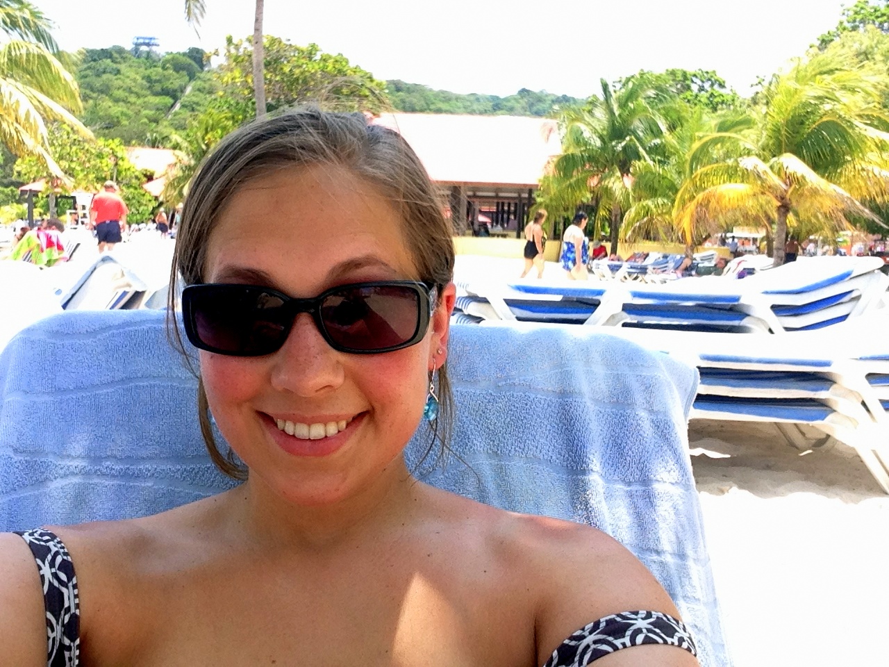 This is me in Haiti, enjoying the sunshine and trying not to think about the poverty that is right over the fence.