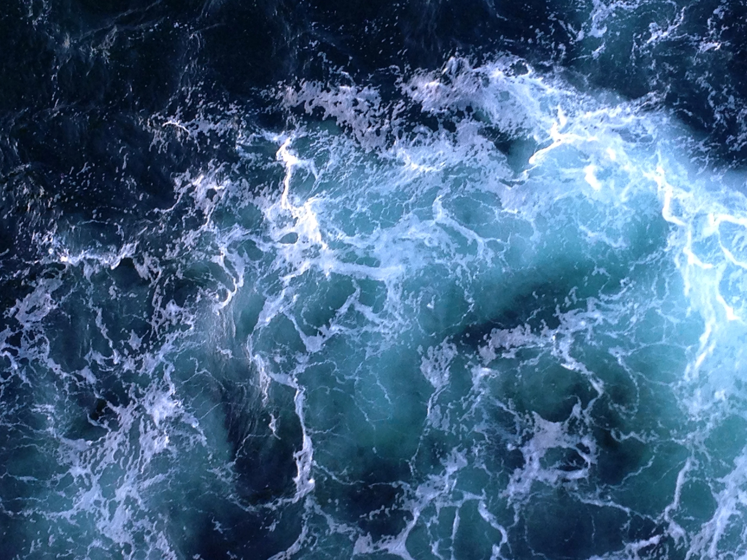 The water sloshy the cruise ship stirred up.