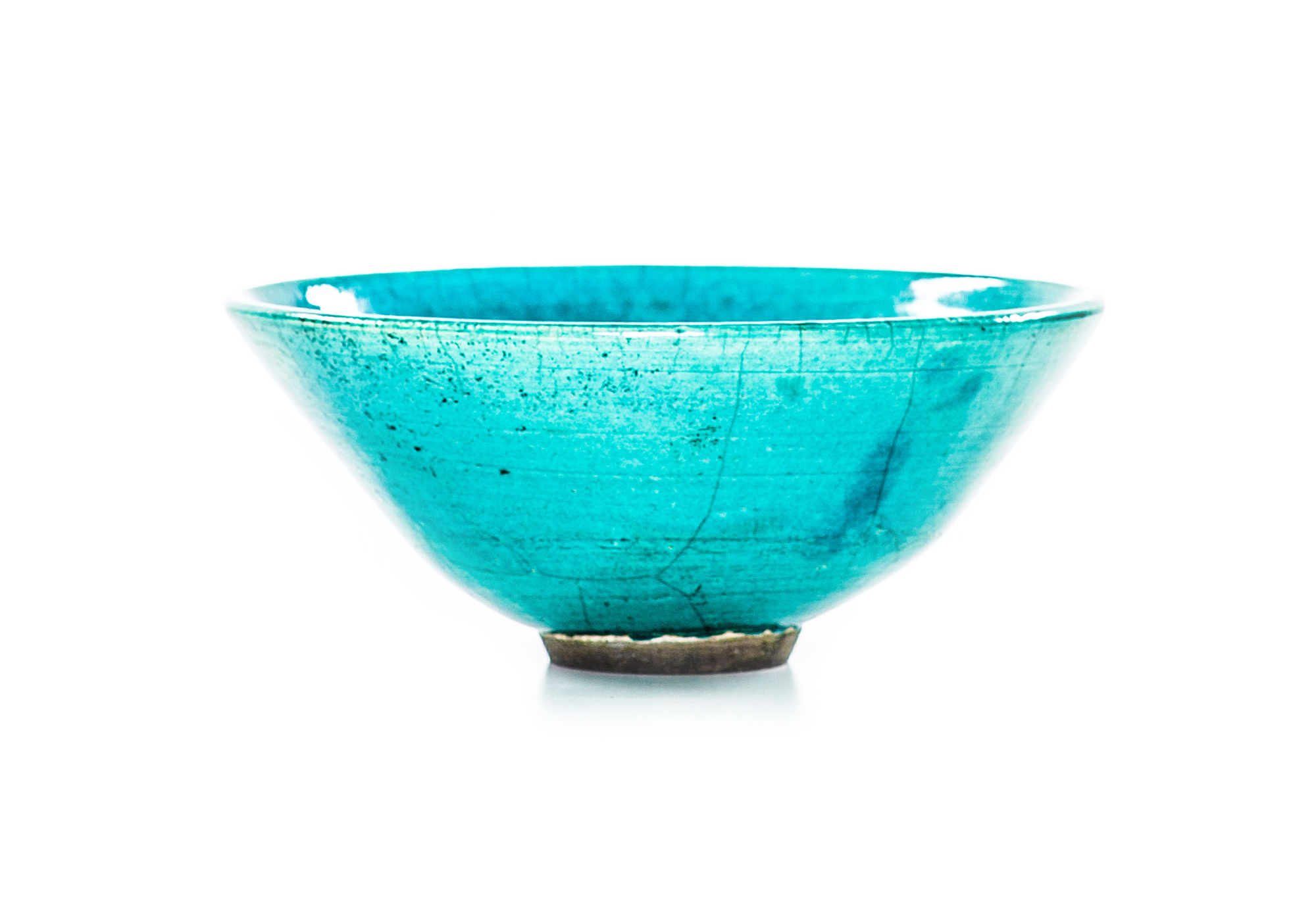 Turquoise raku bowl with copper