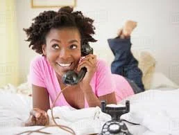 someone talking on an old fashioned phone.jpeg