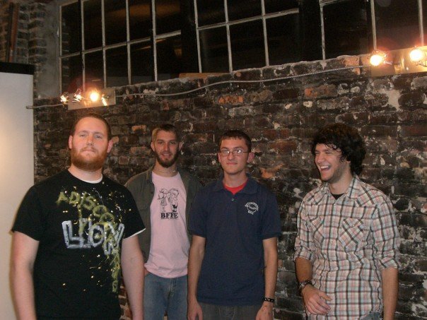 Original Prisms lineup, pictured at Relative Theory Records, December 2006. From left: Nick Huber, John Martin, Nathan Mitchell, Sam Hurd