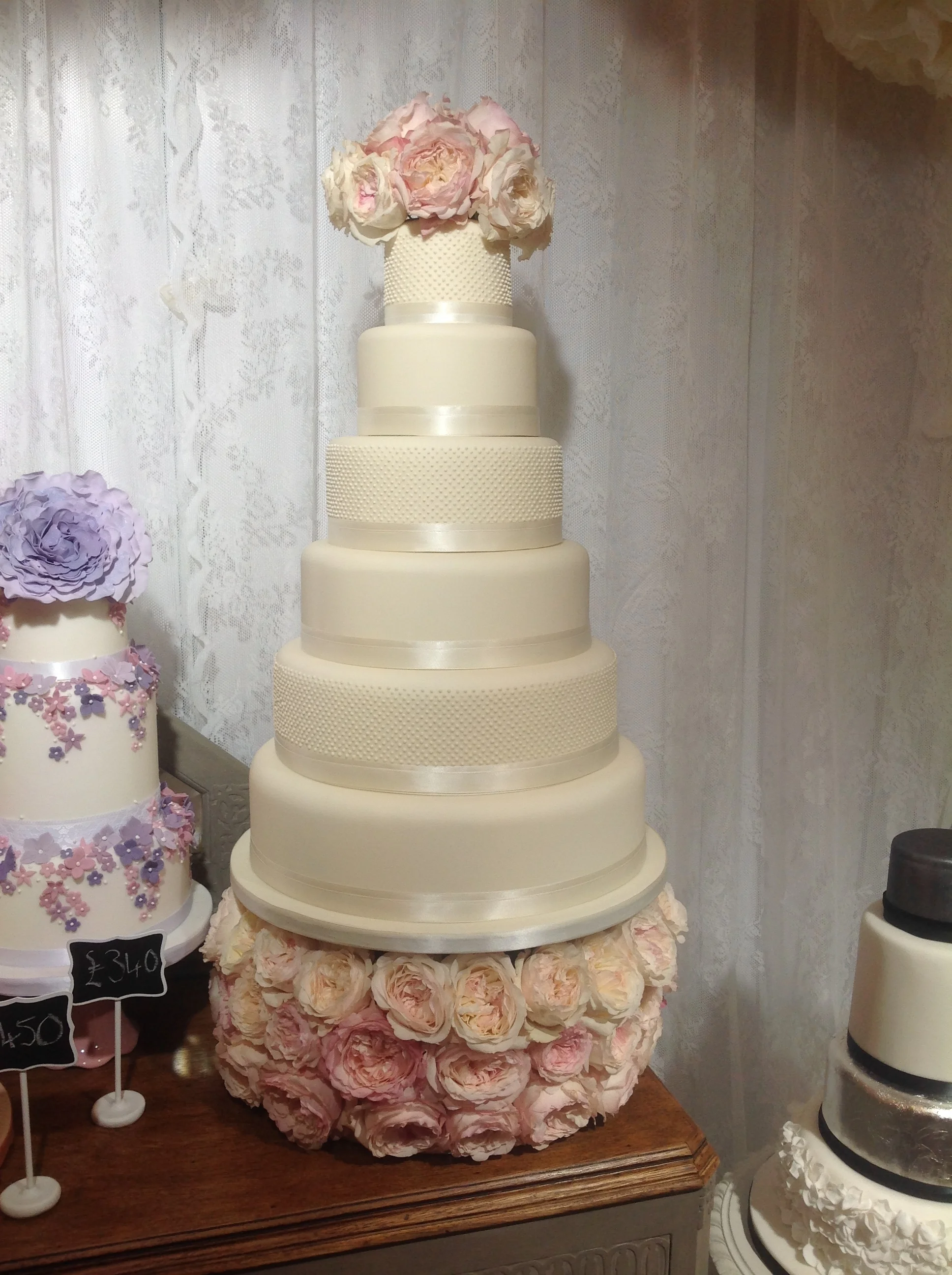 Ivory pearl 6 tier cake with David Austin Roses