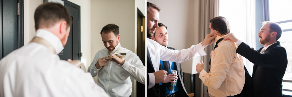 groom tying tie at the press hotel in portland maine