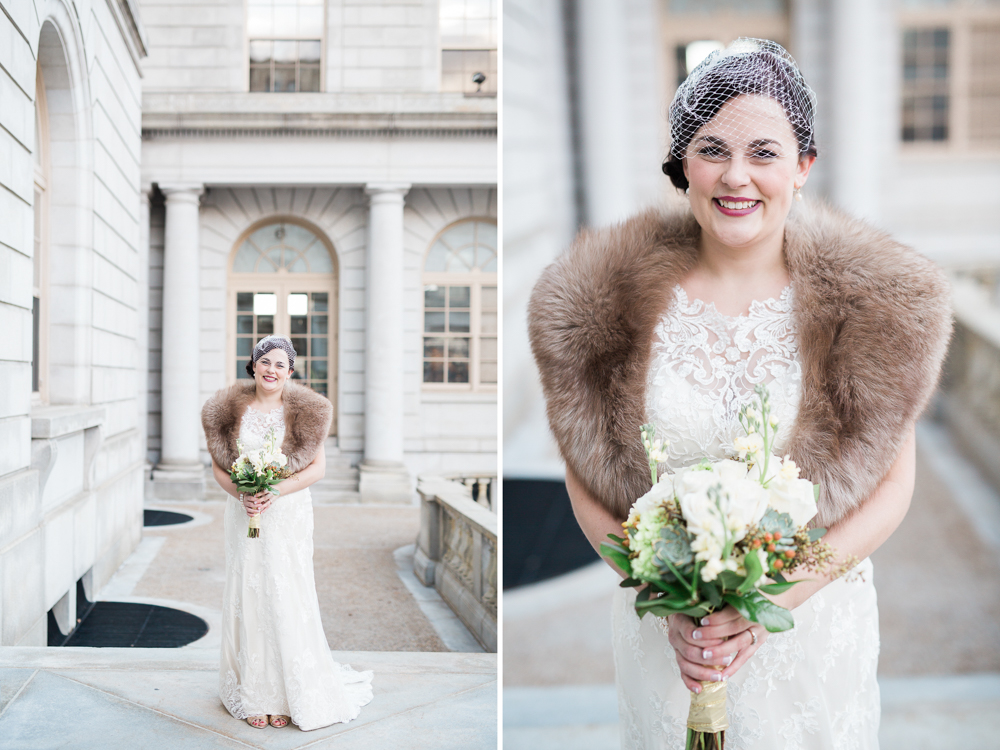 bride at the portland city hall with white flowers, a birdcage veil, and a mink