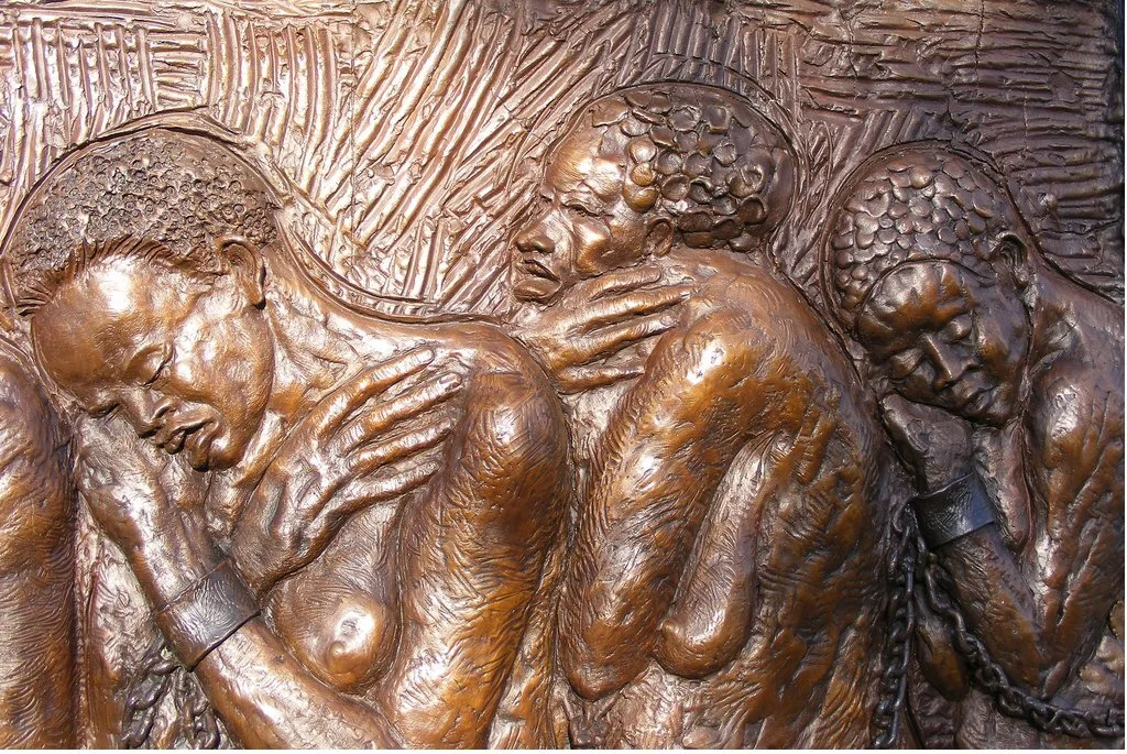 slaves-carved-in-wood.jpg