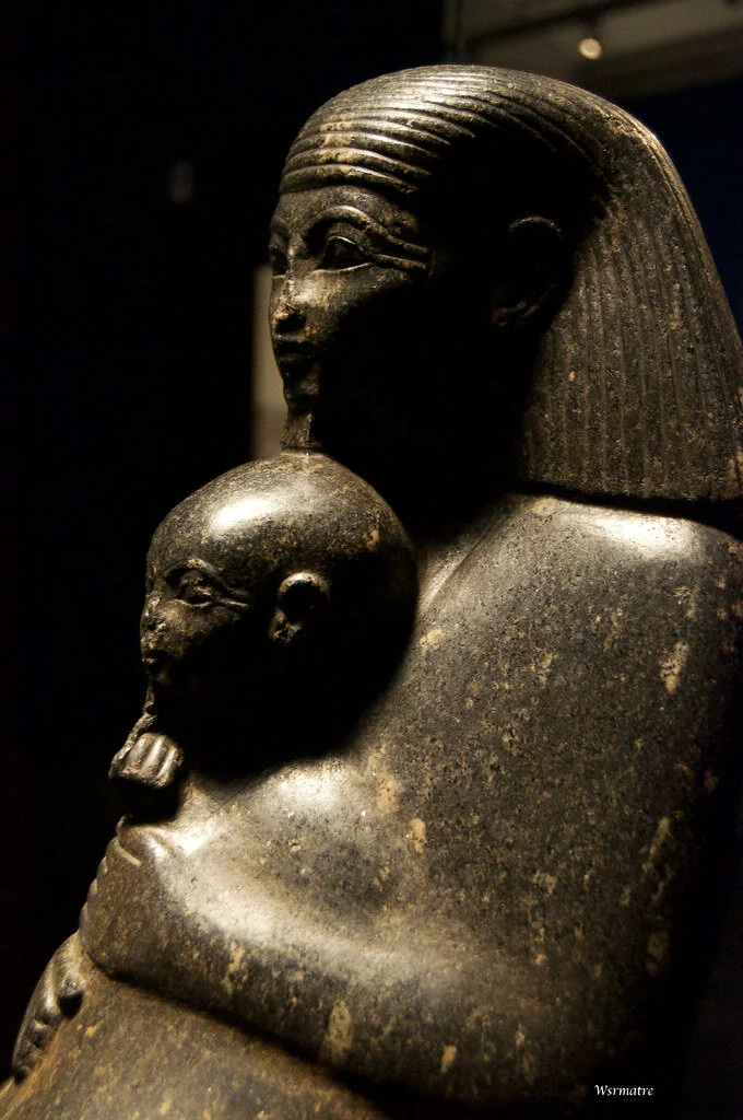 Goddess auset holding her baby, heru. marble and stone carvings such as this, along with written stories on papyrus, helped introduce other world CULTURES to the earliest nubian / kushite / egyption belief system (religion), and subsequently to chri…